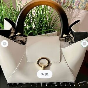 Elegant White Handbag with Gold Accents